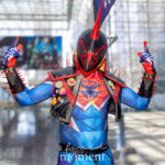 @talent4cosp cosplaying Spider-Punk from Spider-Man: Across the Spider-Verse with spiked gauntlets, punk vest, and horned helmet at Anime NYC 2025 Javits Center – animenyc.com.
