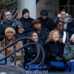 Elected officials seated on stage at the Mamdani inauguration outside New York City Hall on January 1, 2026, including U.S. Senator Bernie Sanders, as the ceremony continues.