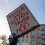 Protest sign reading “Hitler had Gestapo. Trump has ICE!” held up during a winter protest in New York City.