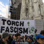 Protesters holding a “Torch Fascism” banner while marching near St. Patrick’s Cathedral in New York City.