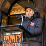 Oscar Isaac speaks at a podium during The People’s Filibuster outside The Public Theater in New York City.