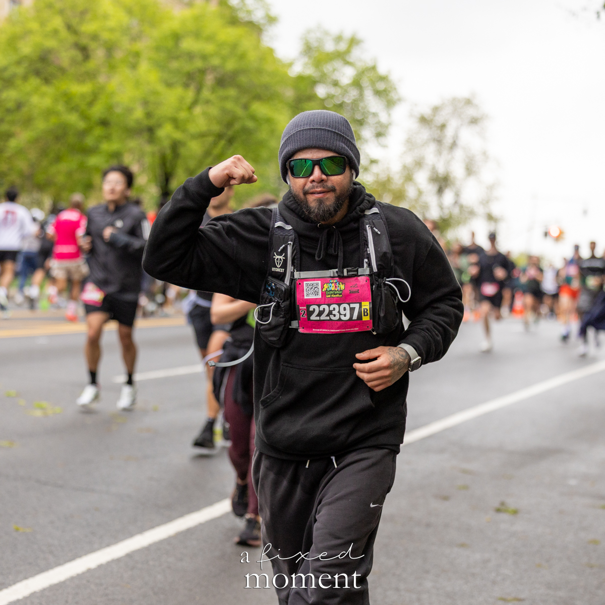 Runner flexes during the race