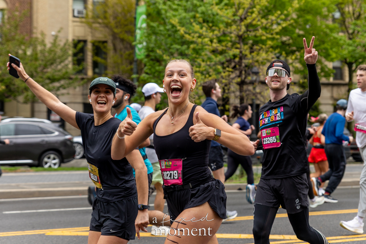 Group of runners gives thumbs up