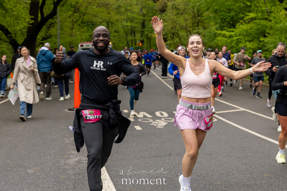 Runners wave and give thumbs up