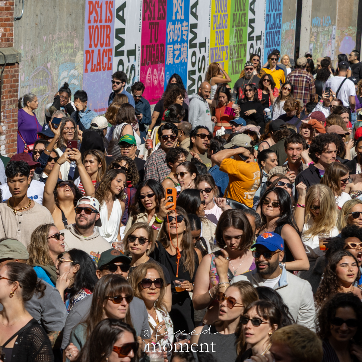 Crowd and posters in the plaza