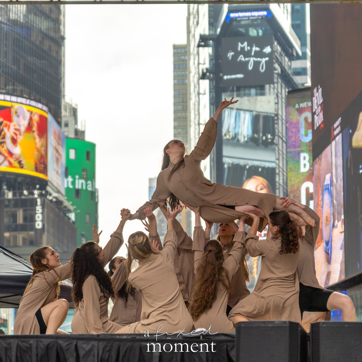 Project Dance group lift with reaching dancer