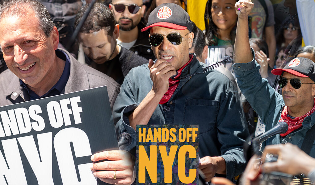Tom Morello speaks and raises his fist during a Hands Off NYC immigrant justice rally outside 26 Federal Plaza in New York City.