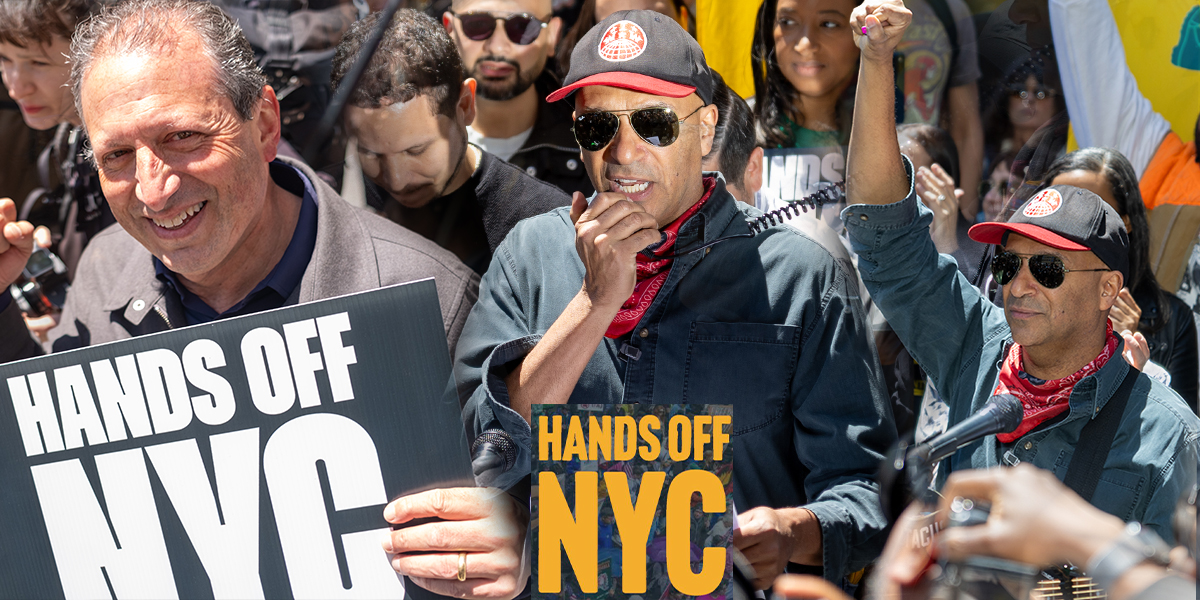 Tom Morello speaks and raises his fist during a Hands Off NYC immigrant justice rally outside 26 Federal Plaza in New York City.