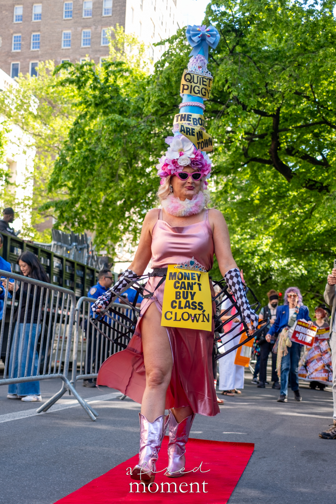 Street scene from the Resistance Red Carpet protest outside the Met Gala in New York City