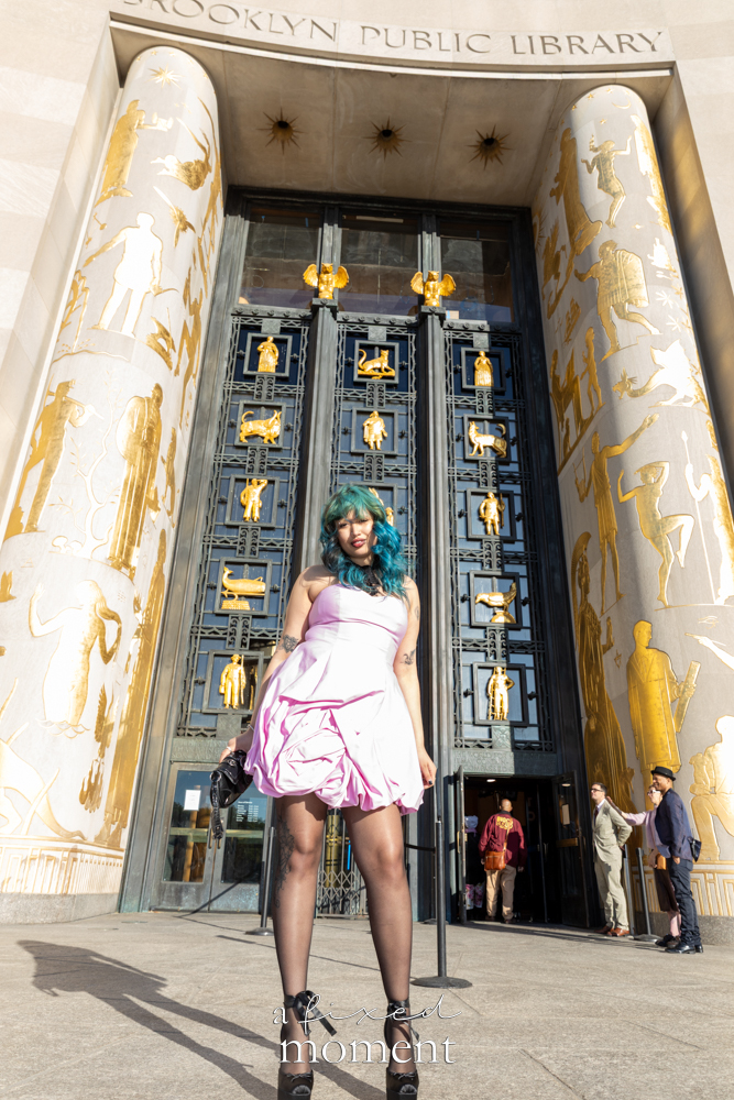 Attendee poses near the Brooklyn Public Library entrance during Brooklyn's 2026 People's Ball