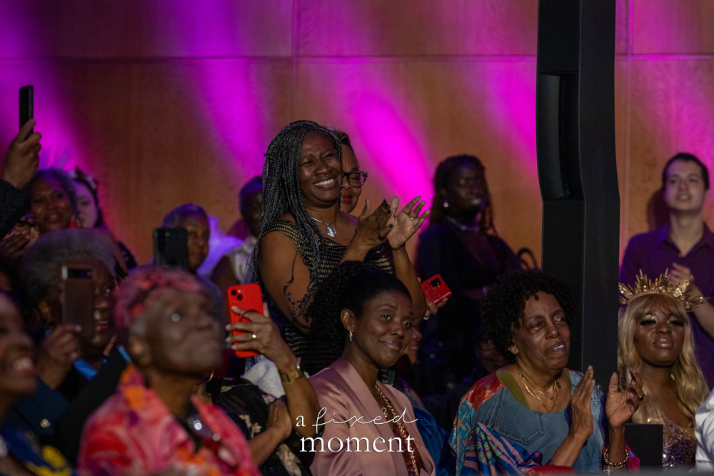 Audience applauds and records the runway during Brooklyn's 2026 People's Ball