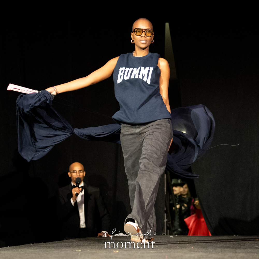 Participant walks the runway with flowing fabric at Brooklyn's 2026 People's Ball