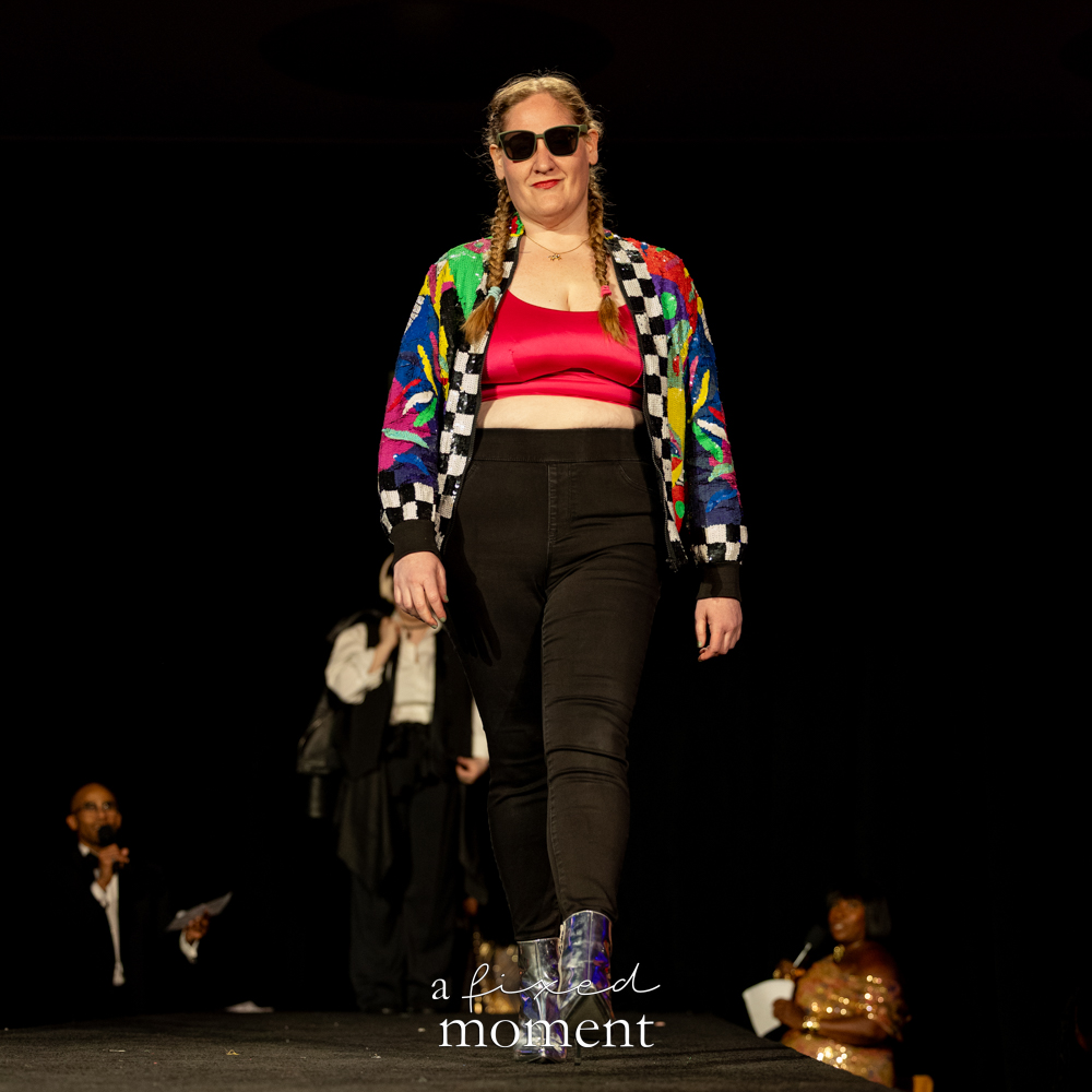 Participant in a colorful jacket walks the runway at Brooklyn's 2026 People's Ball