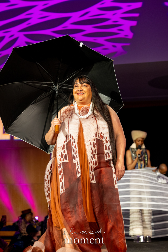Patricia Michaels walks with an umbrella during Brooklyn's 2026 People's Ball
