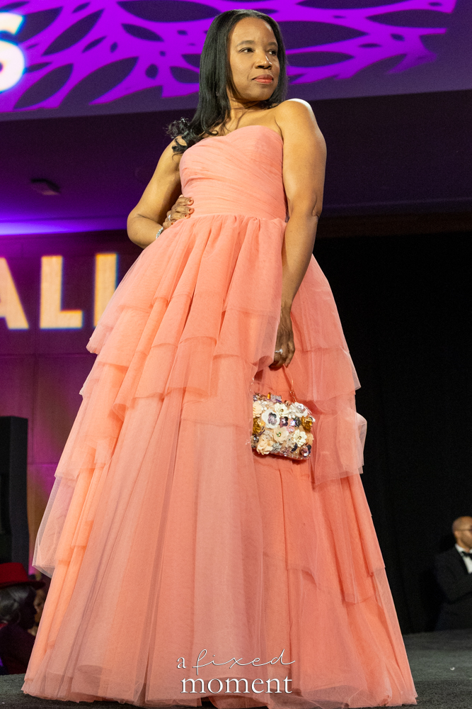 Participant in a peach tulle gown on the runway at Brooklyn's 2026 People's Ball