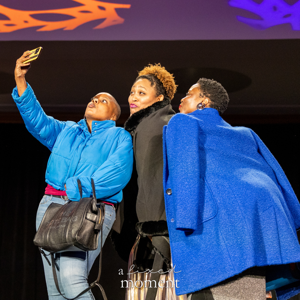 Three participants take a selfie on the runway at Brooklyn's 2026 People's Ball