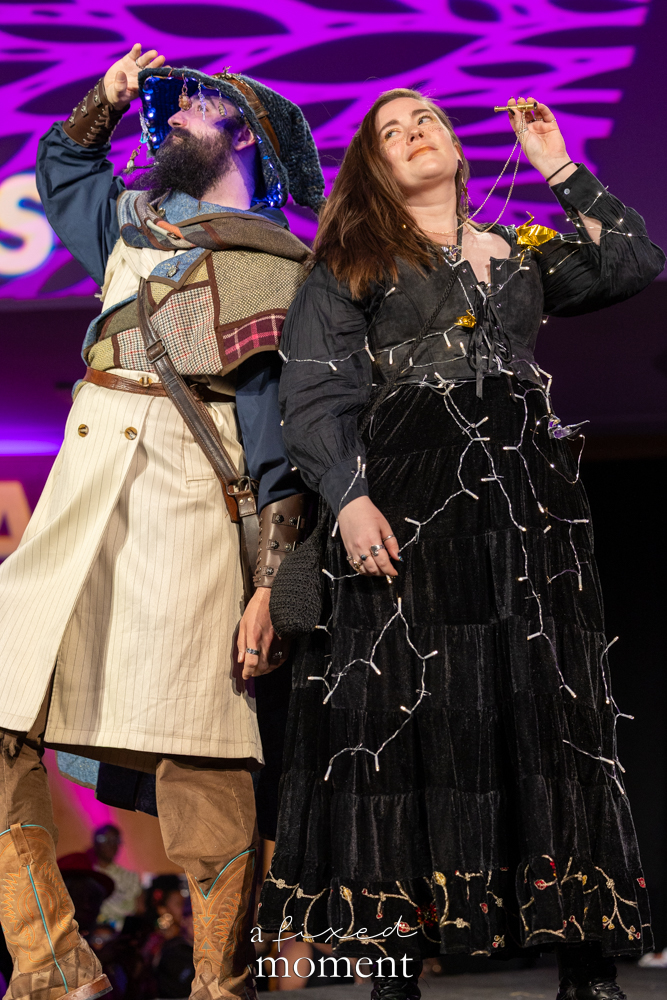 Two participants in constellation-inspired runway looks at Brooklyn's 2026 People's Ball