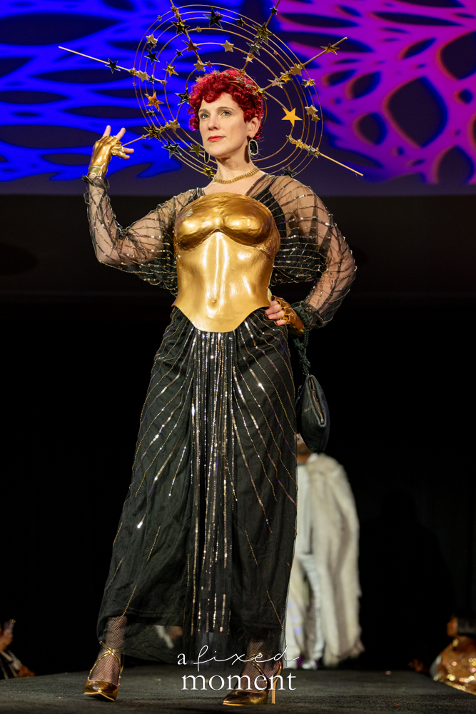 @ugretchen walks the runway in a gold celestial look with a starburst headpiece at Brooklyn's 2026 People's Ball