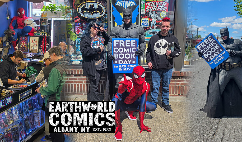 Batman and Spiderman cosplayers pose with attendees during Free Comic Book Day at Earthworld Comics in Albany, New York, on May 2, 2026.