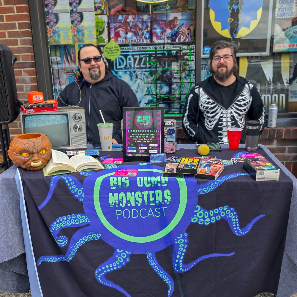 Big Dumb Monsters podcast table during Free Comic Book Day at Earthworld Comics