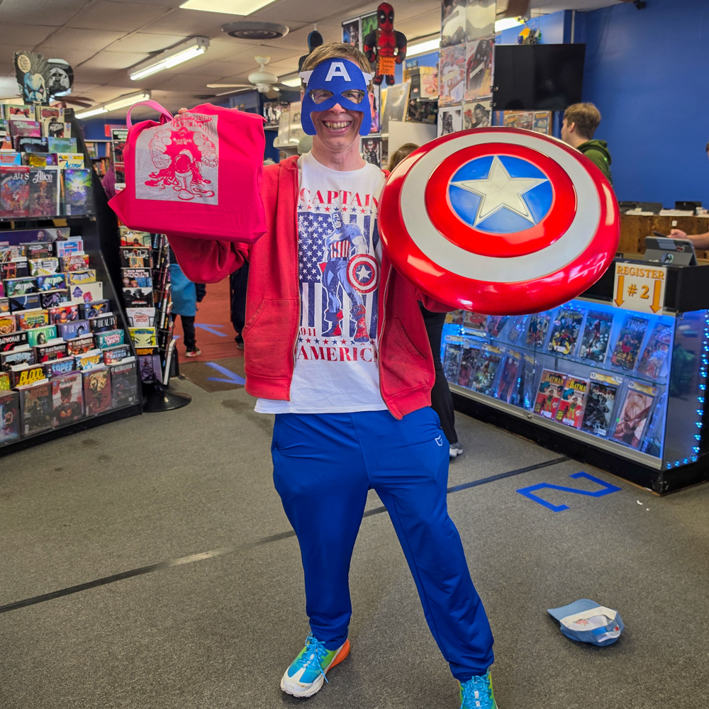 Captain America cosplay display during Free Comic Book Day at Earthworld Comics