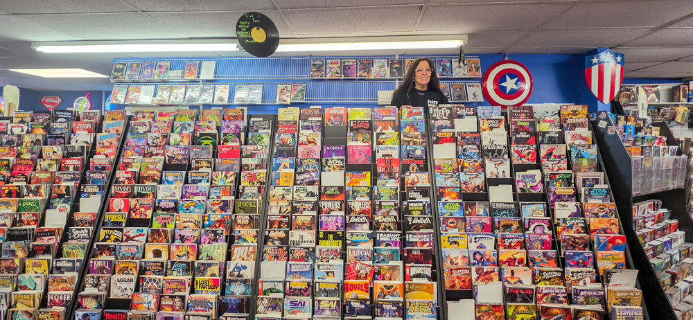 Comic wall display at Earthworld Comics during Free Comic Book Day