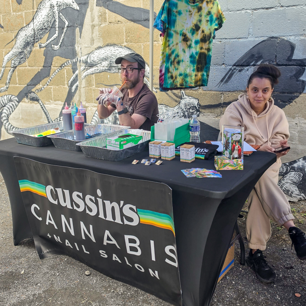 Cussins Cannabis vendor table outside Earthworld Comics during Free Comic Book Day in Albany, New York