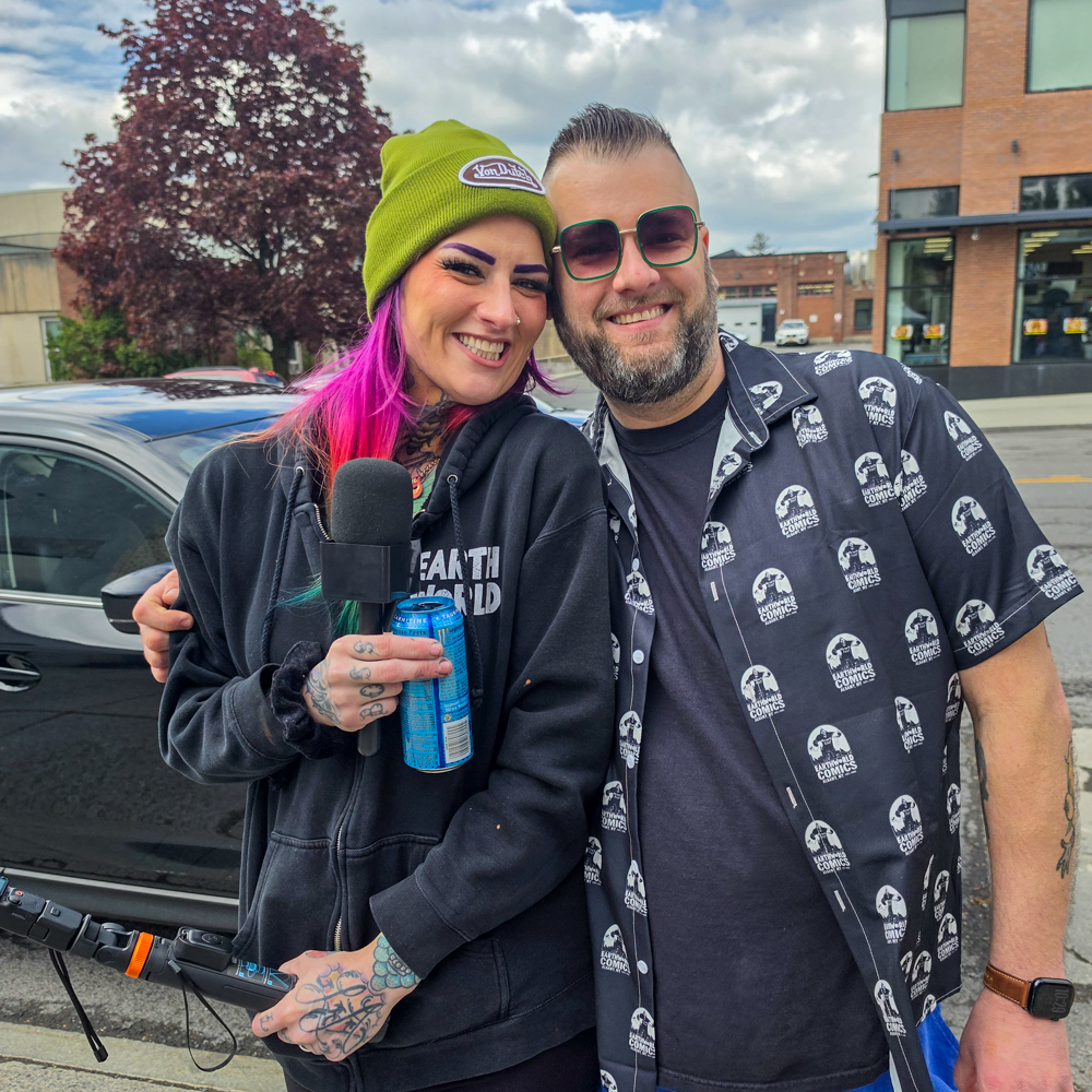 Podcast host and attendee portrait during Free Comic Book Day at Earthworld Comics
