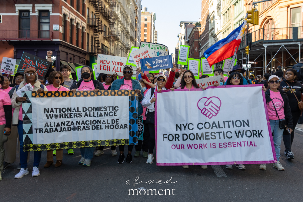 Domestic workers groups march with banners during the May Day Protest in New York City on May 1, 2026