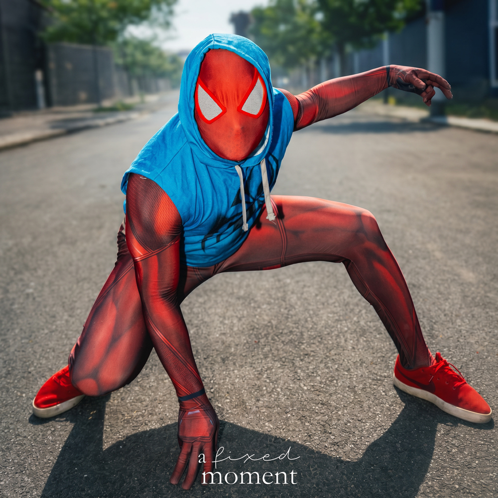 @alfizz in a red and blue masked superhero cosplay at Brooklyn Comic Con 2026