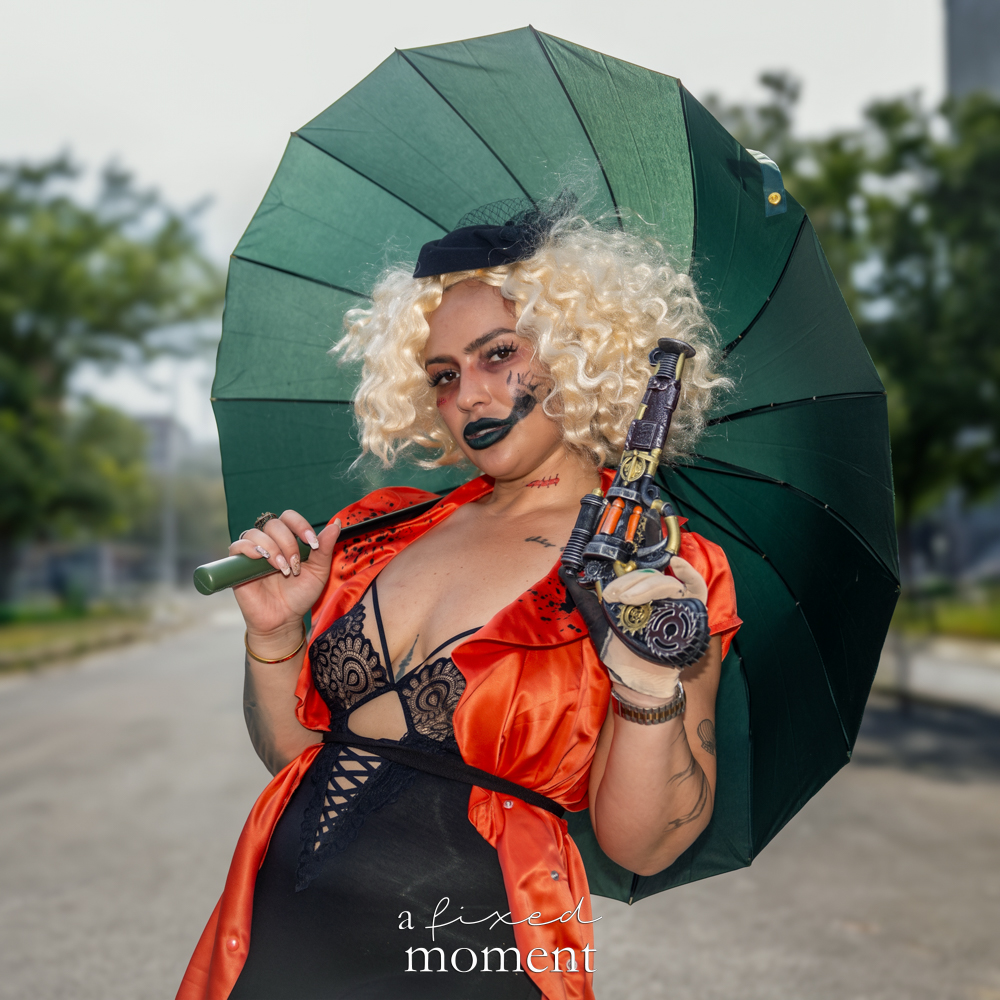 @dani_raine_ in a steampunk parasol cosplay at Brooklyn Comic Con 2026