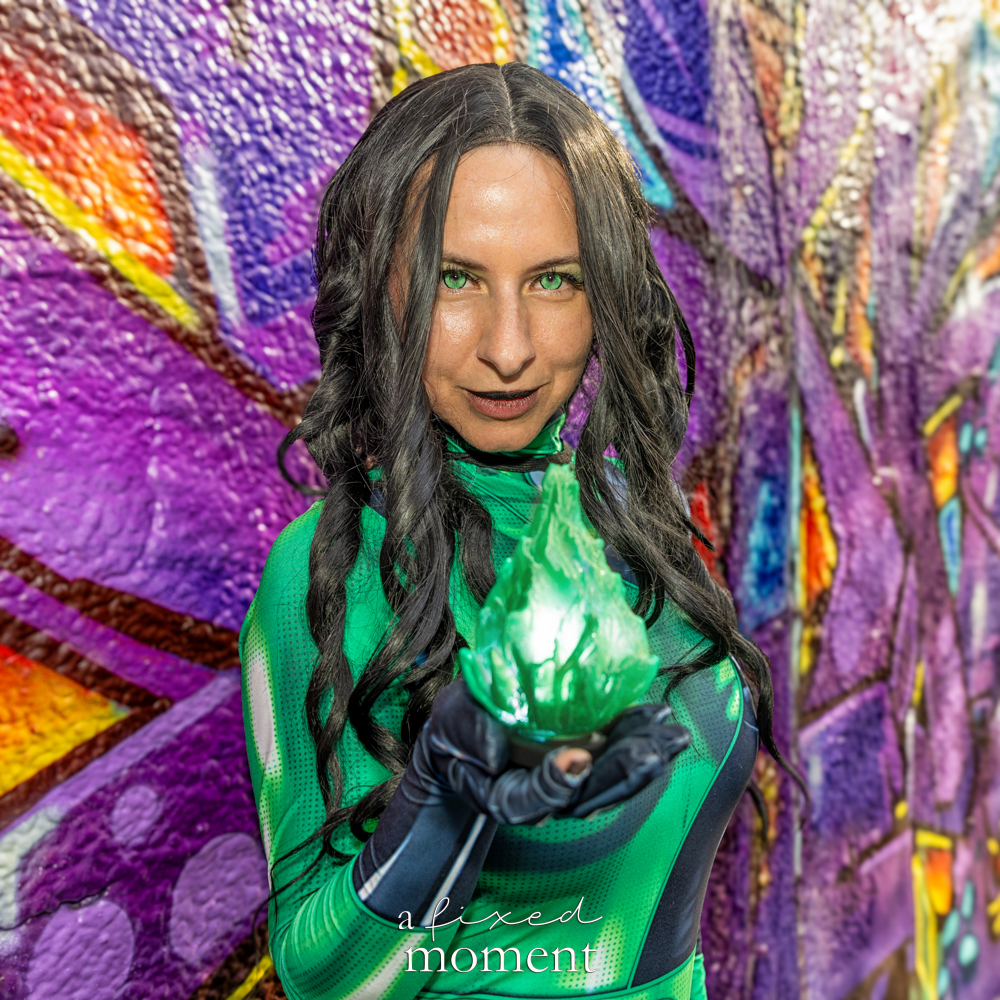 @fit_nurse_xo in a green energy superhero-style cosplay at Brooklyn Comic Con 2026