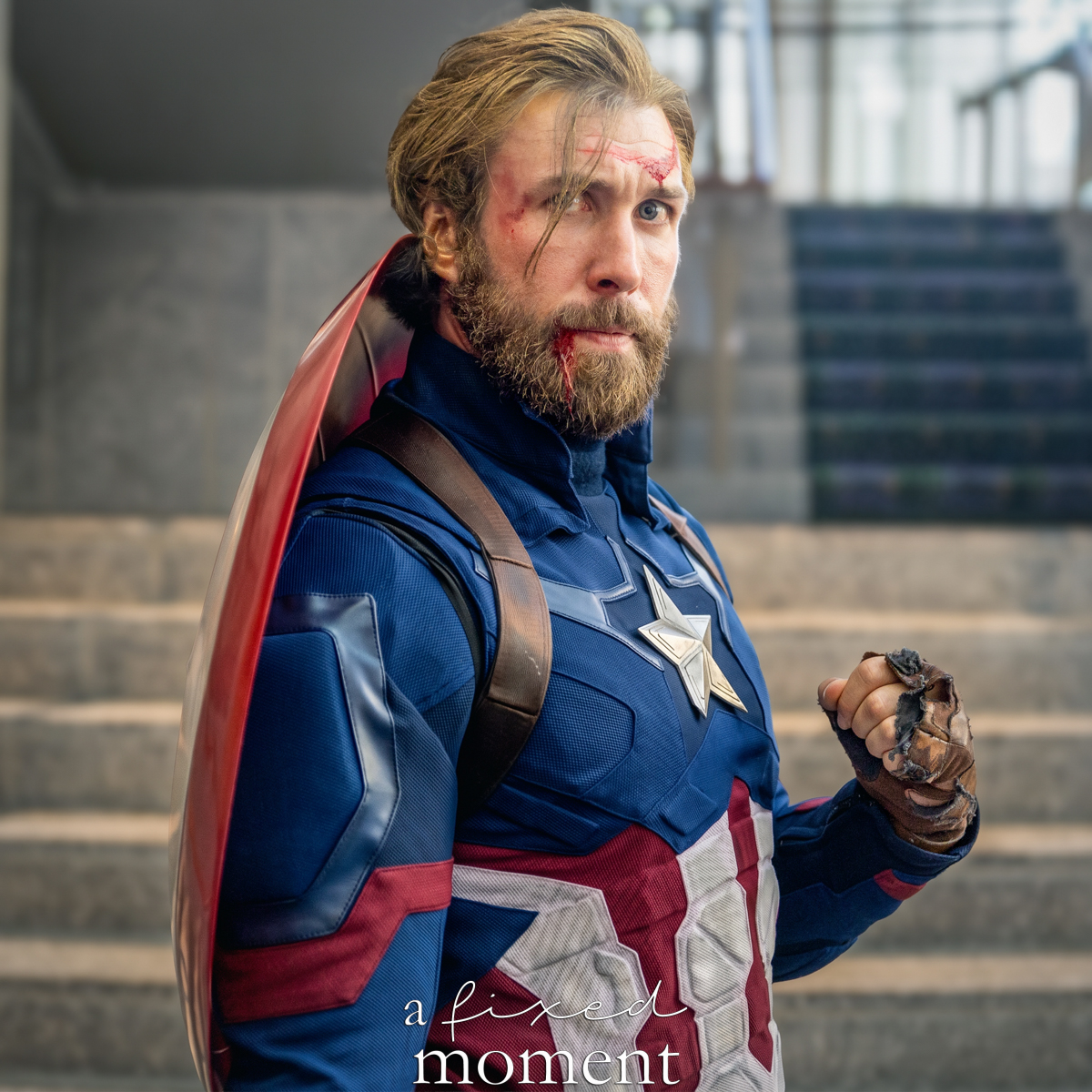Battle-damaged Captain America cosplay with Mjolnir by the_muscle_geeks_podcast_ at Fan Expo Philadelphia 2026