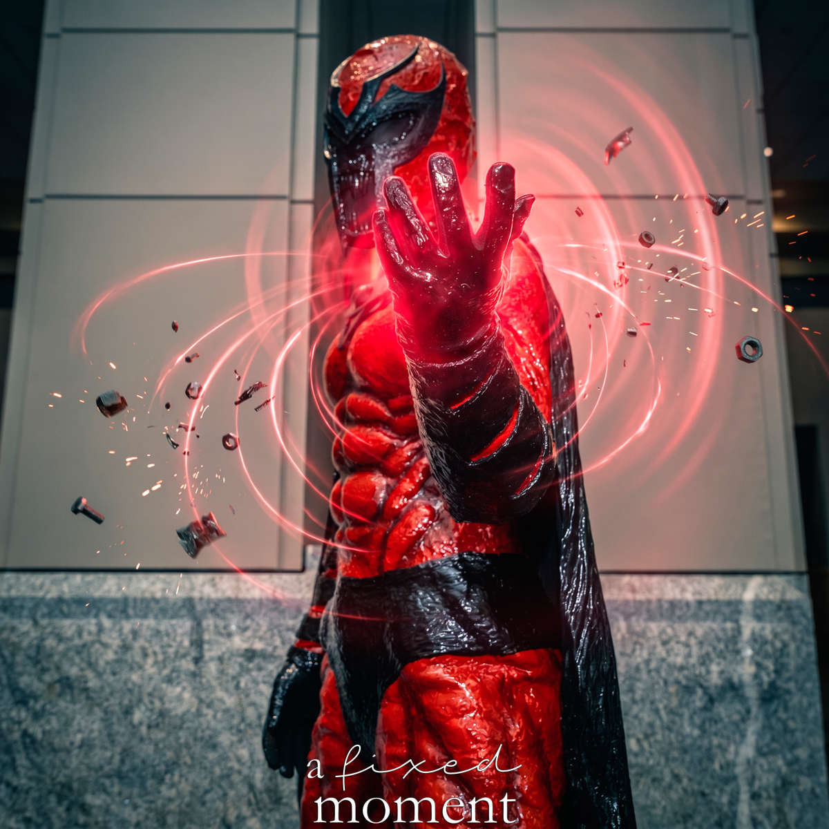 Venomized Magneto-inspired cosplay by cosplayben with stylized magnetic effect at Fan Expo Philadelphia 2026