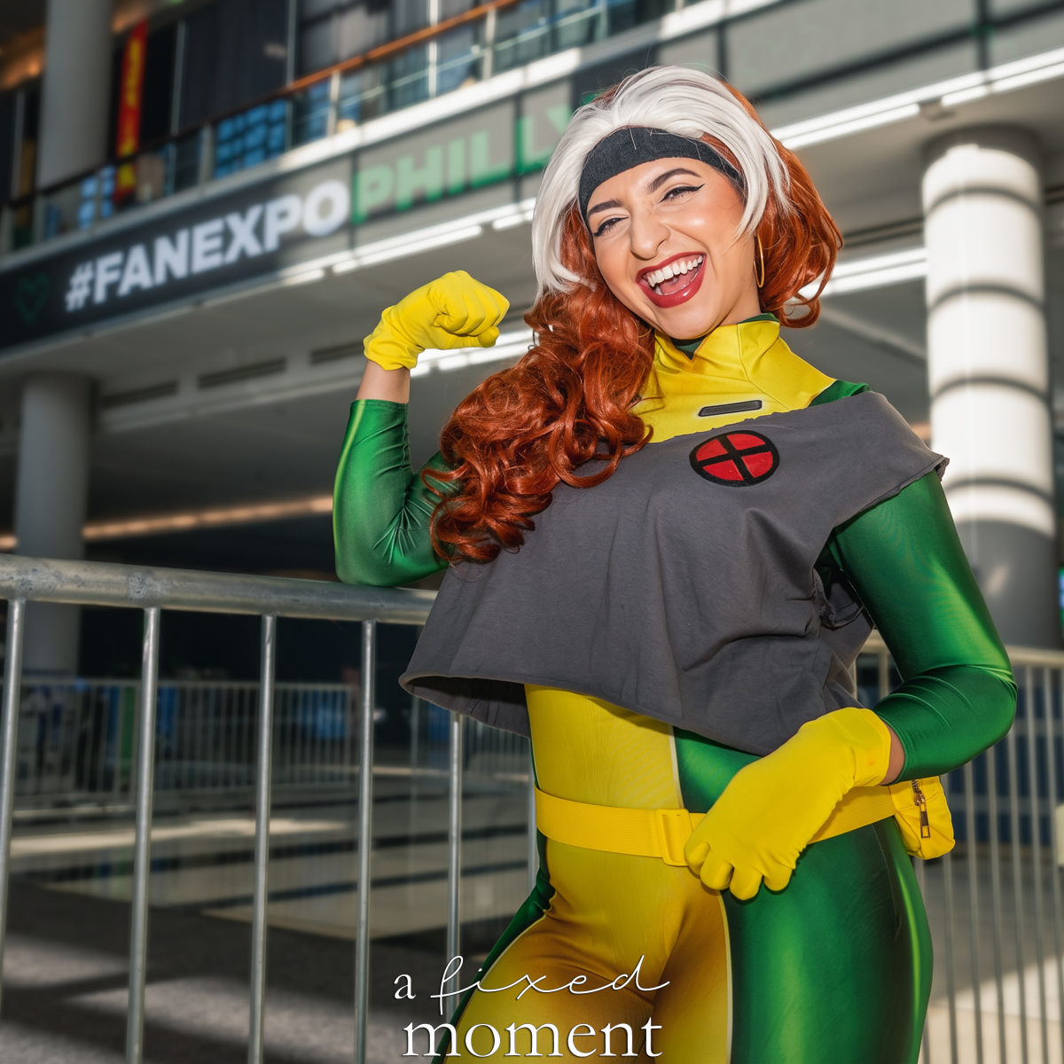 Rogue X-Men cosplay by heyitslilly near Fan Expo Philadelphia signage at Fan Expo Philadelphia 2026