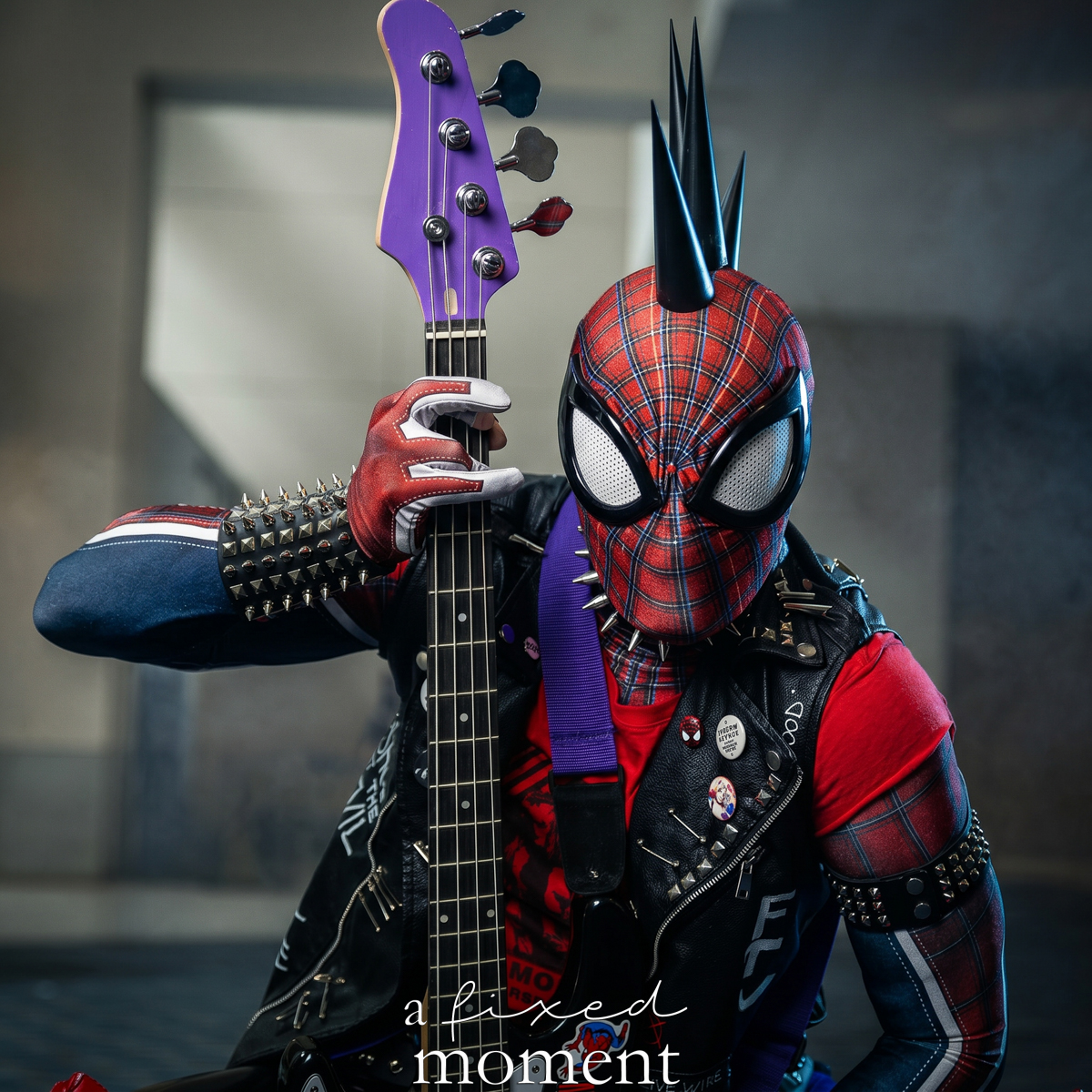 Spider-Punk cosplay by cosplaydza with bass guitar at Fan Expo Philadelphia 2026