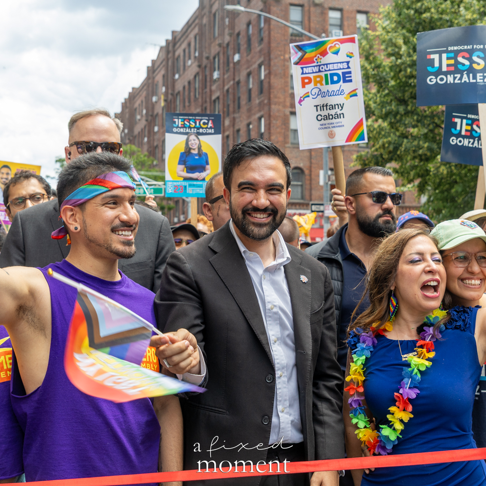 Mayor Zohran Kwame Mamdani walks with Brian Romero and Assemblymember Jessica González-Rojas during the New Queens Pride Parade in Jackson Heights.