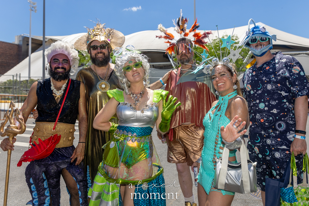 Costumed sea-royalty group at the Mermaid Parade.