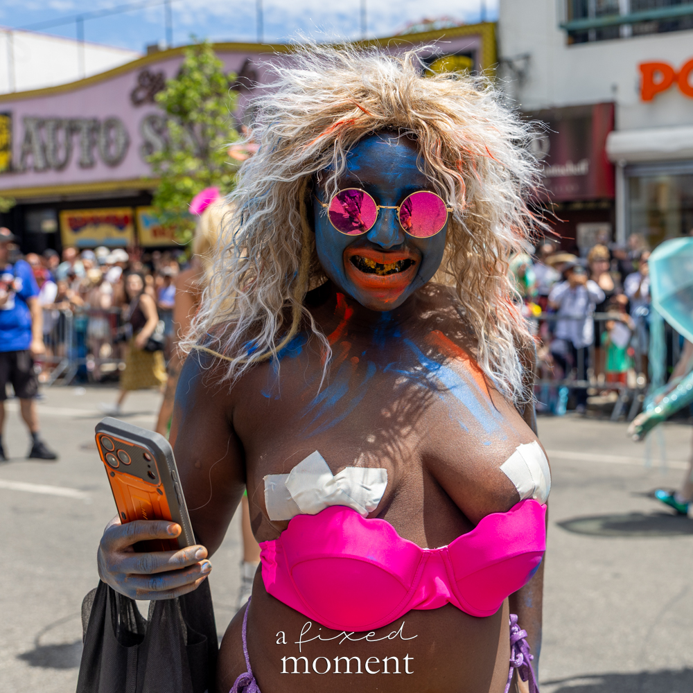@crackheadbarneyandfriends__ in a hot-pink mermaid-style costume at the Mermaid Parade.