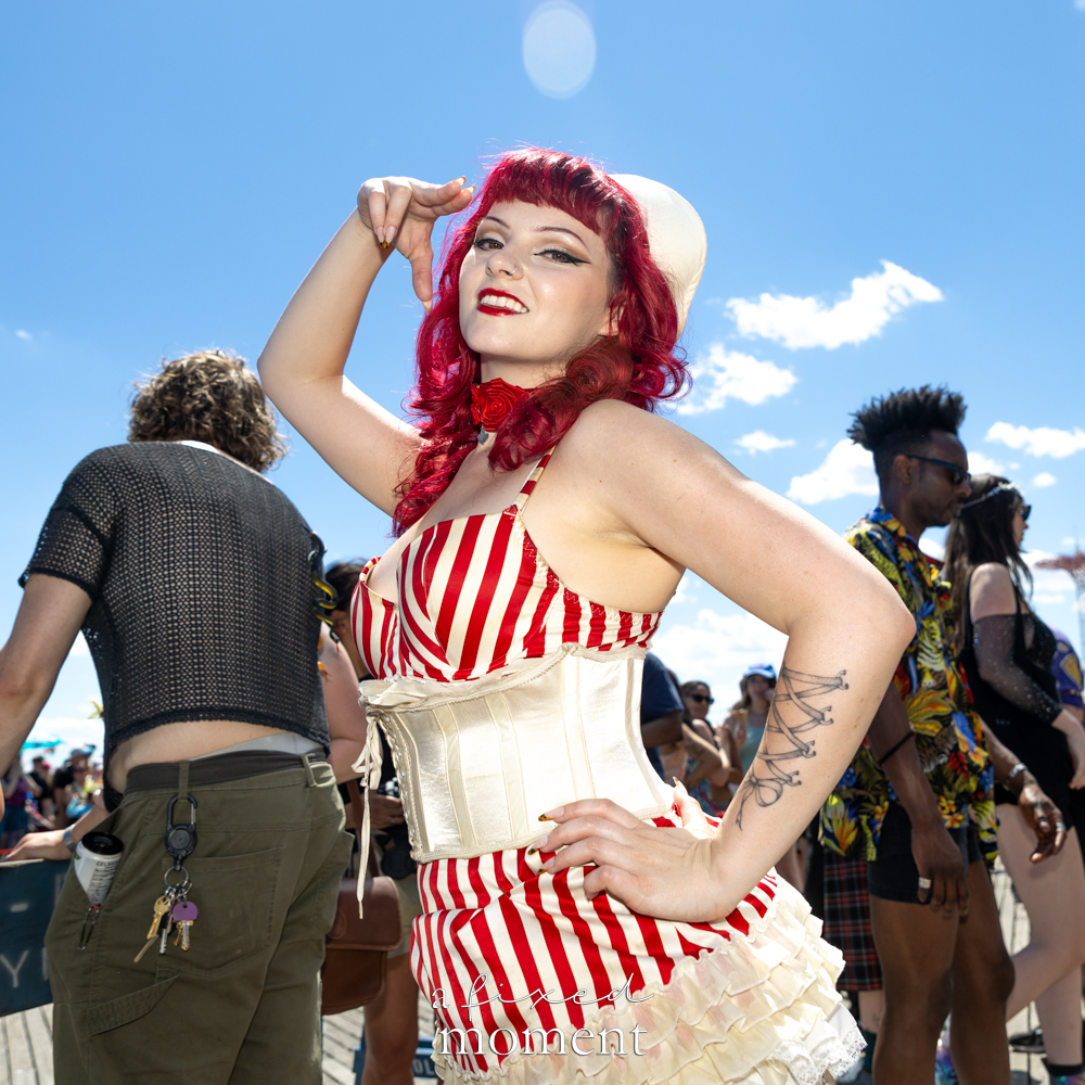 @fionaodellbradley in a red-and-white striped pinup boardwalk costume at the Mermaid Parade.