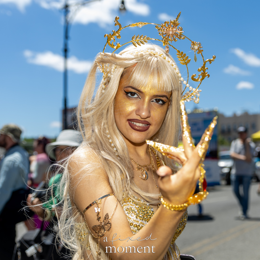 Gold sea-goddess portrait at the Mermaid Parade.