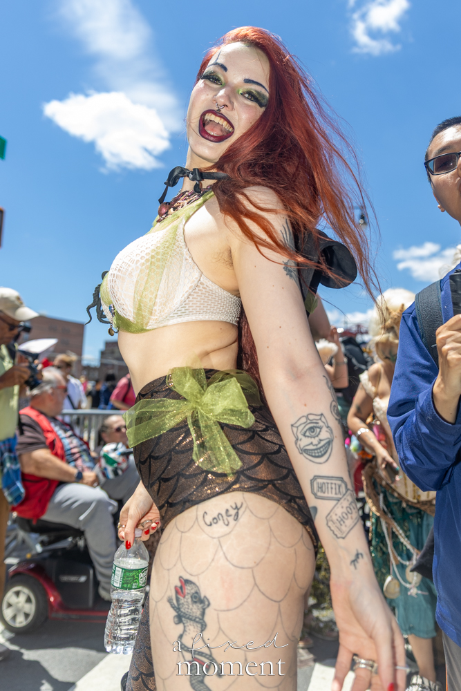 @obsidian_absurd red-haired mermaid portrait at the Mermaid Parade.