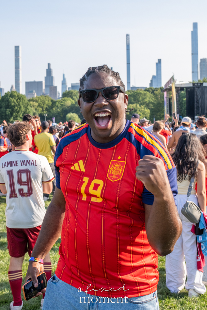Spain supporter raising a fist during the World Cup Final celebration in Central Park