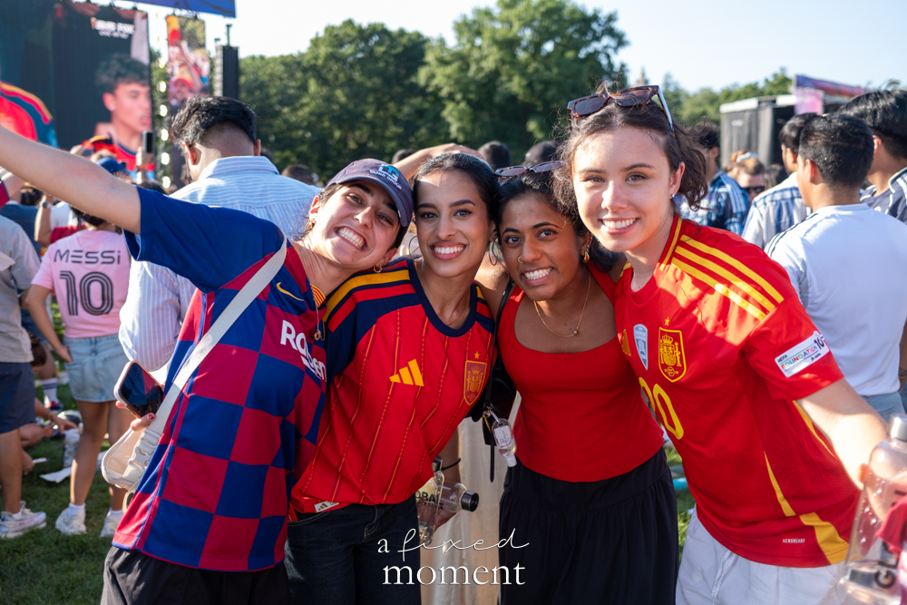 Group portrait of Spain supporters celebrating the World Cup victory