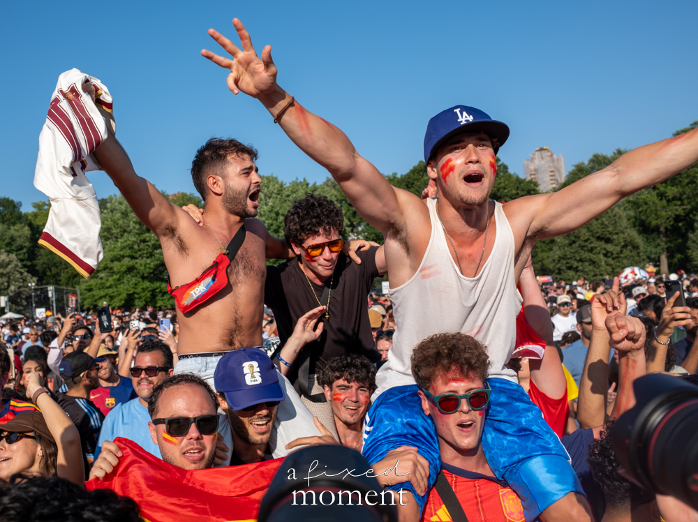 Spain fan celebrating above the crowd after the World Cup Final