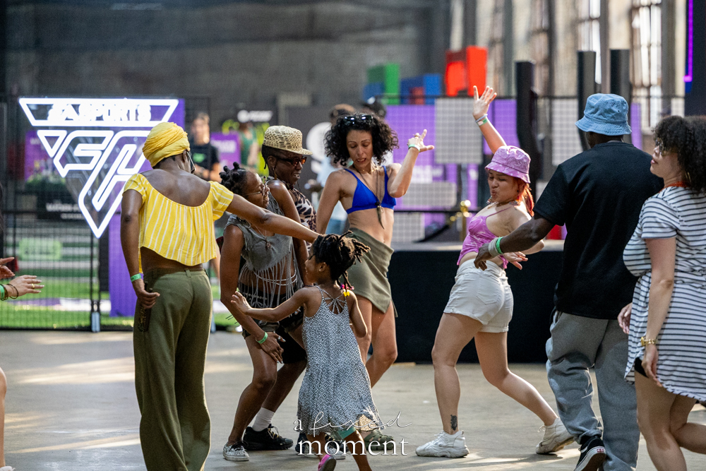 Group dancing near the EA SPORTS FC area during House of GOAL
