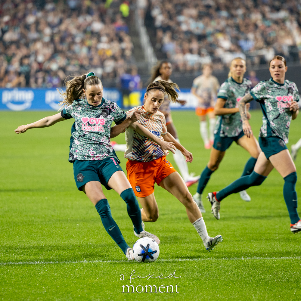 Gotham FC and Washington Spirit players battling for possession at Citi Field