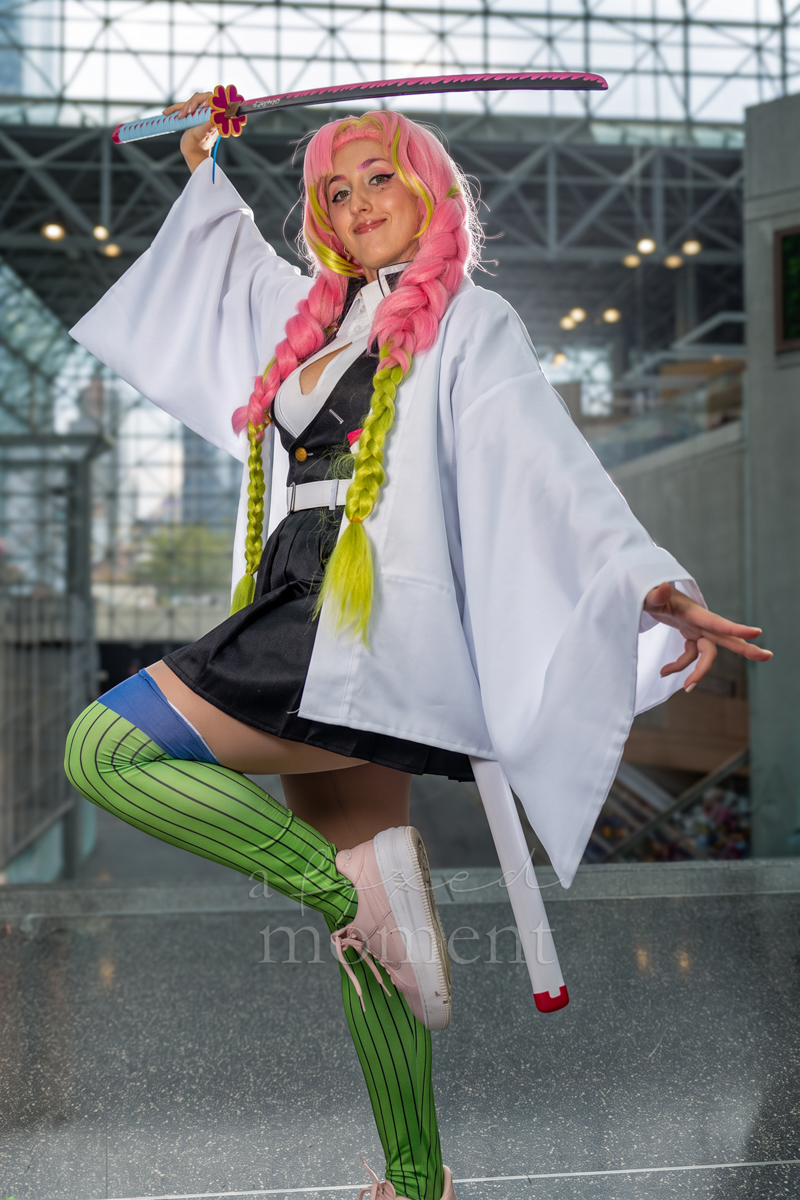 @kaeda_kaze.cosplay poses as Mitsuri Kanroji from Demon Slayer during Anime NYC 2026