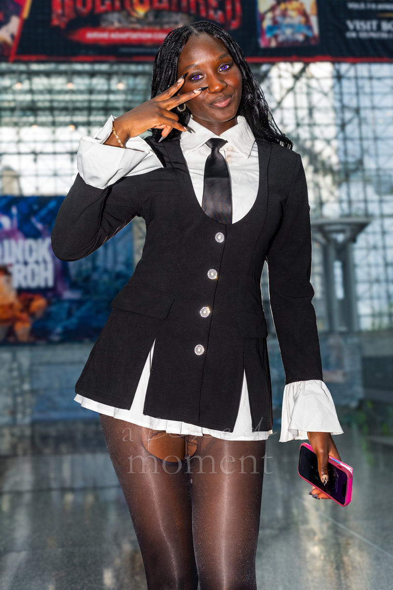 @mary.m.ba poses in black-and-white cosplay during Anime NYC 2026