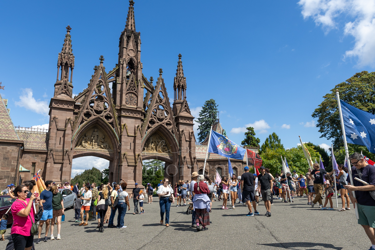 Crowd gathers for the flag procession during the Battle of Brooklyn 250 commemoration